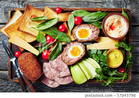 ploughman's lunch on a wooden tray, flatlay ploughman's lunch on a wooden tray, flatlay 57843798