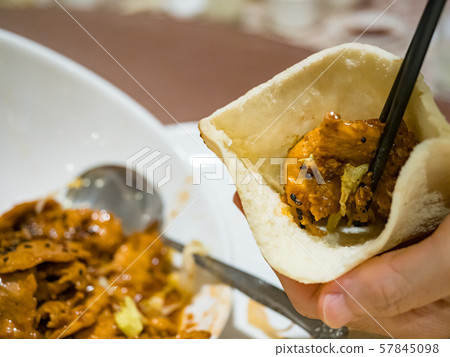 pocket bread with braised pork neck pocket bread with braised pork neck 57845098