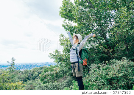 A young woman climbing 57847593