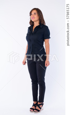 Full body shot of happy beautiful businesswoman looking up Full body shot of happy beautiful businesswoman looking up 57865175