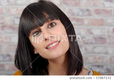 Beautiful casual brunette woman portrait Beautiful casual brunette woman portrait 57867232