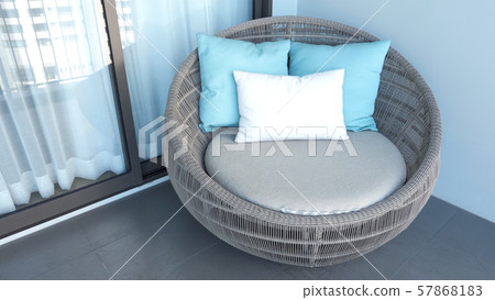 Outdoor beach chair on the hotel room balcony or terrace which made from natural wood called rattan and brown color round shape and look luxury for relaxing or sleeping or for party. Outdoor beach chair on the hotel room balcony or terrace which made from natural wood called rattan and brown color round shape and look luxury for relaxing or sleeping or for party. 57868183