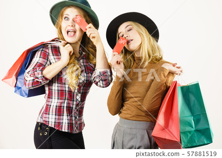 Two woman after sale shopping Two woman after sale shopping 57881519