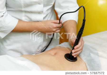 Woman getting anti cellulite therapy in beauty 57887572