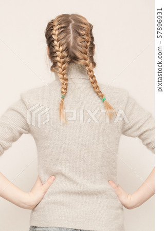Young girl with the two braids Young girl with the two braids 57896931
