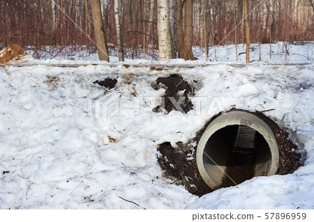 Pipe culvert in the snow winter Pipe culvert in the snow winter 57896959