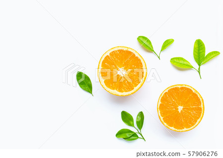 Fresh orange citrus fruit with leaves isolated Fresh orange citrus fruit with leaves isolated 57906276
