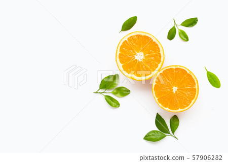 Fresh orange citrus fruit with leaves isolated Fresh orange citrus fruit with leaves isolated 57906282