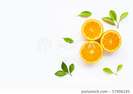 Fresh orange citrus fruit with leaves isolated Fresh orange citrus fruit with leaves isolated 57906285