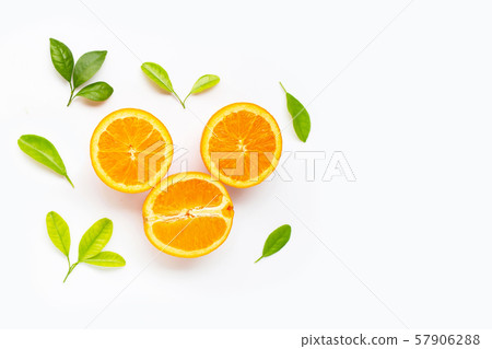 Fresh orange citrus fruit with leaves isolated Fresh orange citrus fruit with leaves isolated 57906288