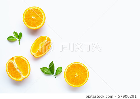 Fresh orange citrus fruit with leaves isolated Fresh orange citrus fruit with leaves isolated 57906291