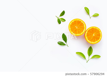 Fresh orange citrus fruit with leaves isolated Fresh orange citrus fruit with leaves isolated 57906294