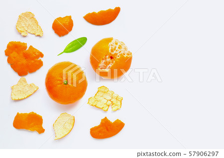Orange with peel on white. Copy space Orange with peel on white. Copy space 57906297