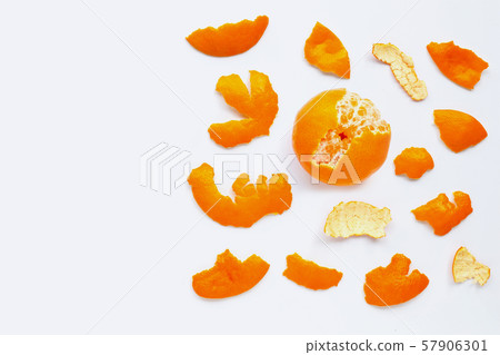 Orange with peel on white. Copy space Orange with peel on white. Copy space 57906301