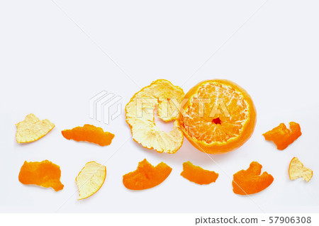 Orange with peel on white. Copy space Orange with peel on white. Copy space 57906308