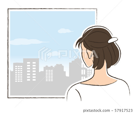 A woman looking out the window 57917523