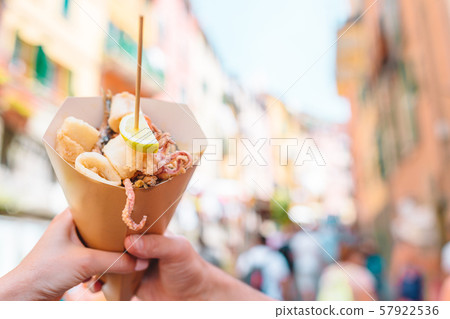 Italian street food grilled seafood fish, shrimps, calamari and vegetables Italian street food grilled seafood fish, shrimps, calamari and vegetables 57922536
