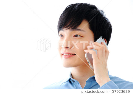 A man calling on a smartphone - Stock Photo [57923629] - PIXTA