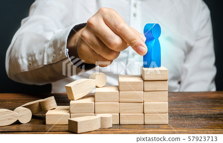 Businessman promotes employee on the career ladder. Opportunity of growth and development in the company. Appointment of an employees to a new post. Promotion of a successful worker. Businessman promotes employee on the career ladder. Opportunity of growth and development in the company. Appointment of an employees to a new post. Promotion of a successful worker. 57923713