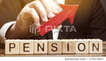 Wooden blocks with the word Pension and up arrow. Improving the financial condition of older people. Surcharge and pension supplements. Loan portfolio growth. Increase pensions fund. Growing payments 57923807