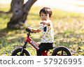 Bicycle with fallen leaves and kids 57926995