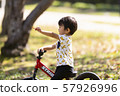 Bicycle with fallen leaves and kids 57926996