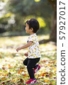 Fallen leaves and children 57927017