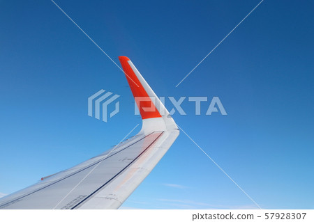 Sea of clouds and airplane wings Sea of clouds and airplane wings 57928307