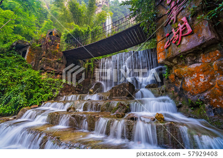 Stunning waterfall at Baofeng lake 57929408