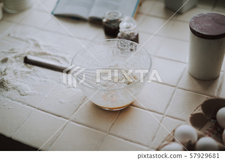Selective focus of a whisk in the bowl with flour 57929681