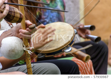 Berimbau and others instruments player during Berimbau and others instruments player during 57930987