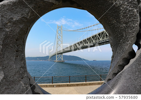 Akashi Kaikyo Bridge and Awaji Island seen from Maiko Park in Kobe Akashi Kaikyo Bridge and Awaji Island seen from Maiko Park in Kobe 57935680