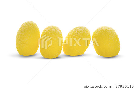 yellow thai silkworm cocoons pile isolated on white background 57936116