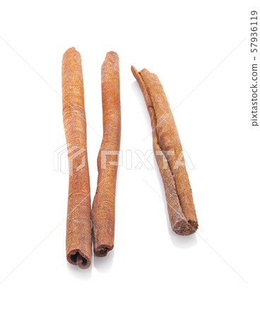 Cinnamon Sticks Stacked isolated on White 57936119
