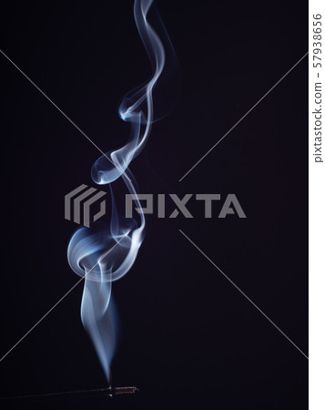 White smoke swirling on black background, close up 57938656