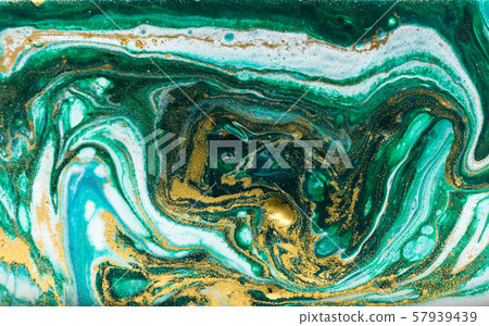 Green and gold marbling pattern. Golden powder marble liquid texture. Green and gold marbling pattern. Golden powder marble liquid texture. 57939439