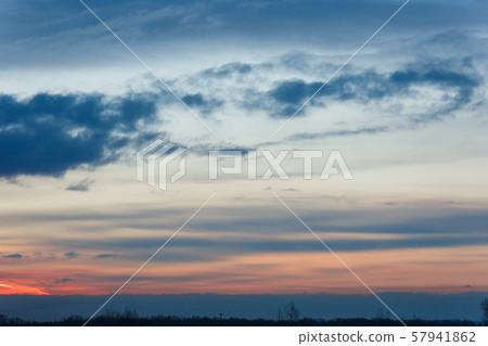 Beautiful winter dawn. Sunlight through the clouds in the morning in winter. Beautiful winter dawn. Sunlight through the clouds in the morning in winter. 57941862