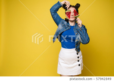 Funny girl with lollipops on eyes and open mouth. Funny girl with lollipops on eyes and open mouth. 57942849