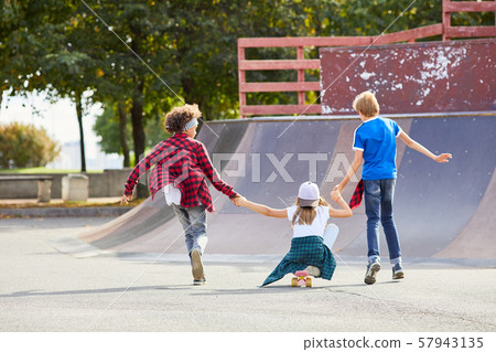 Children having fun in the park Children having fun in the park 57943135