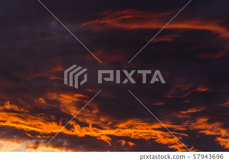 Beautiful dramatic sky. Sunset time. Orange and lilac. Beautiful dramatic sky. Sunset time. Orange and lilac. 57943696