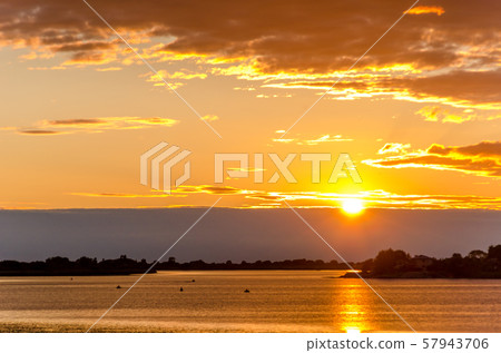 Beautiful sunset over the river. Relaxation and meditation concept. Beautiful sunset over the river. Relaxation and meditation concept. 57943706