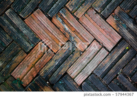 Old brick paving on a sidewalk, ancient old red Old brick paving on a sidewalk, ancient old red 57944367