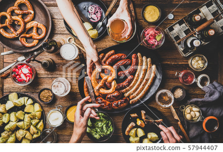 Octoberfest party dinner table with beer, snacks 57944407