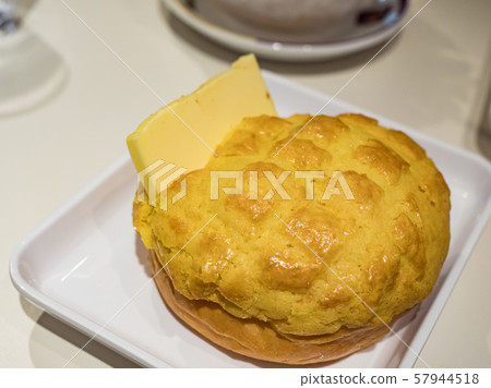 Buttered pineapple bun in dish 57944518