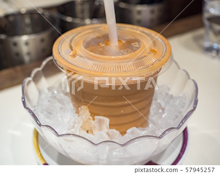 Milk coffee / Coffee with tea in ice Milk coffee / Coffee with tea in ice 57945257