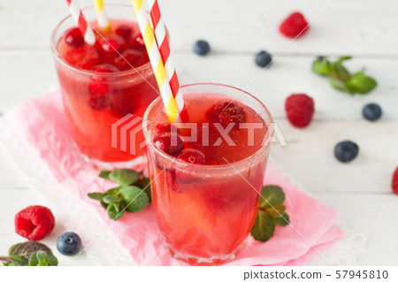 Iced lemonade with berries 57945810