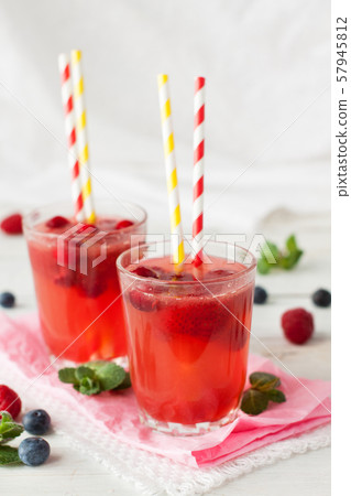 Iced lemonade with berries 57945812