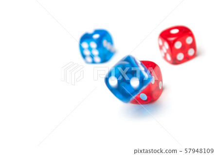 Closeup of colorful dices on white background 57948109