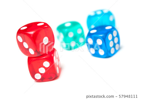 Closeup of colorful dices on white background 57948111