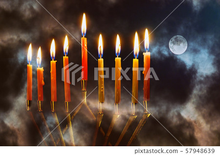 Menorah with candles for hannukah holiday Menorah with candles for hannukah holiday 57948639